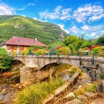 Alpine village of Doussard, a stone bridge over a bubbling stream