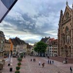 Place de la Republique, the main square in the small city of Mulhouse, Alsace with church and shops