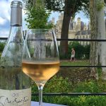 Bottle of wine on a restaurant table, Chateau of Chambord in background