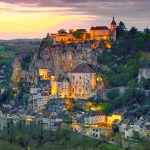 The perched town of Rocamadour clinging to the side of a cliff