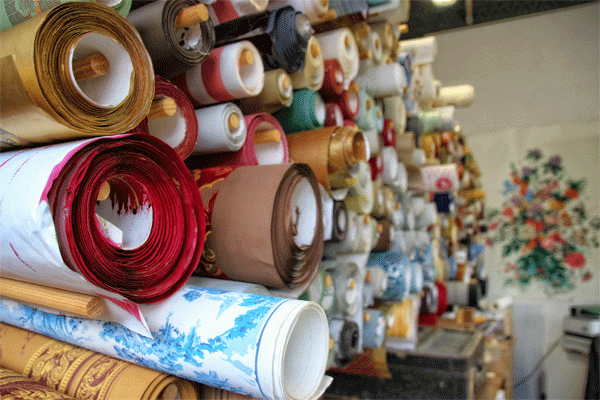Rolls of handblocked wallpaper at Atelier d'Offard Tours