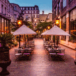 Pink and purple colours of dusk in the garden of the Hotel Les Jardins du Marais in Paris