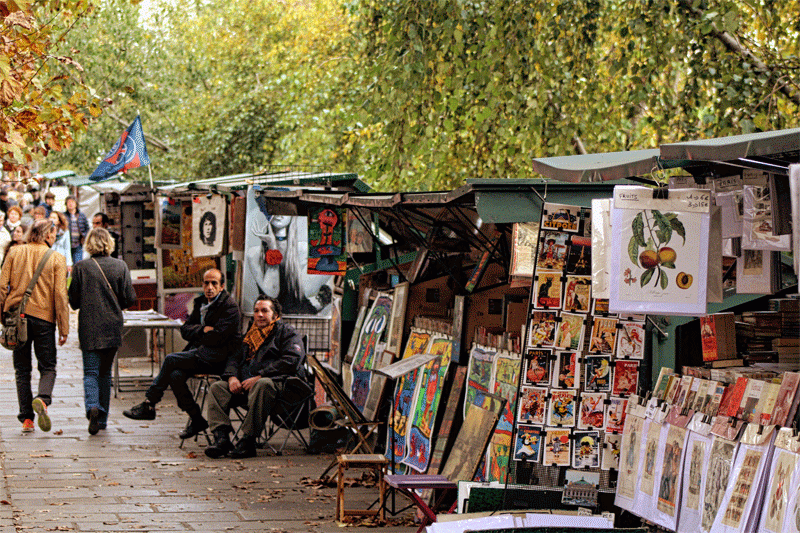 The bouquinistes, second hand book sellers, that line the Seine in Paris
