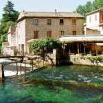 Beautiful riverside restaurant in Fontaine-de-Vaucluse, Provence famous for its very blue water from a spring